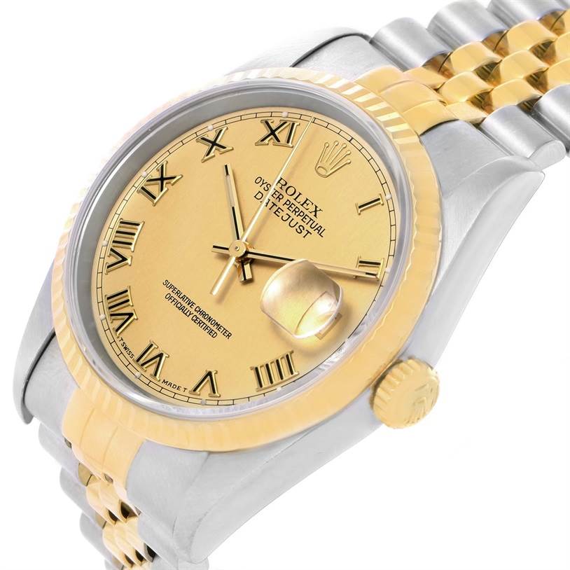 This image shows a close-up of the Rolex Datejust 16233 Men
s Steel and Gold (two tone) Champagne Dial 16233 Men
s Steel and Gold (two tone) Champagne Dial watch at an angle highlighting the dial, bezel, crown, and part of the bracelet.