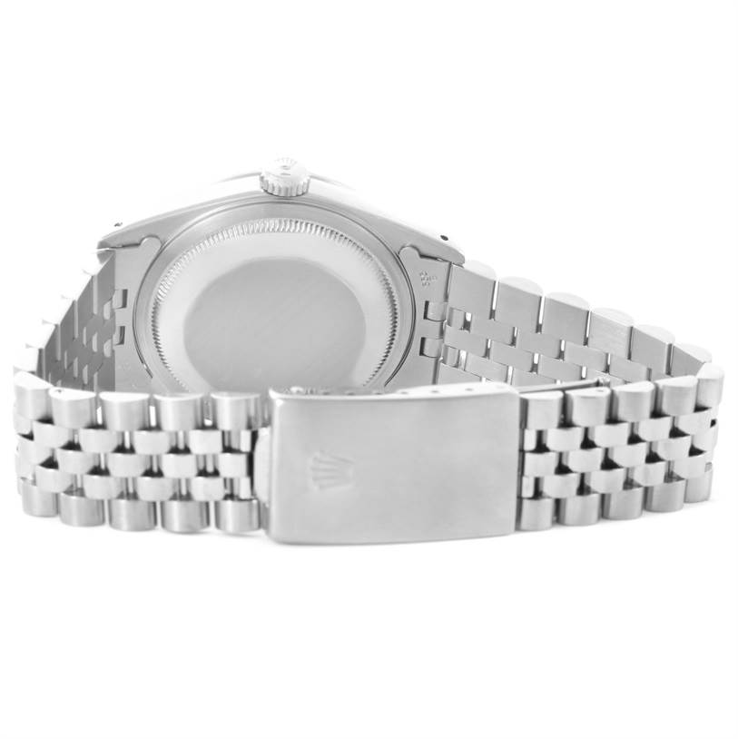 This image shows the back of a Rolex Datejust 16220 Men's Stainless Steel White Dial 16220 Men's Stainless Steel White Dial watch with its stainless steel case and Jubilee bracelet.