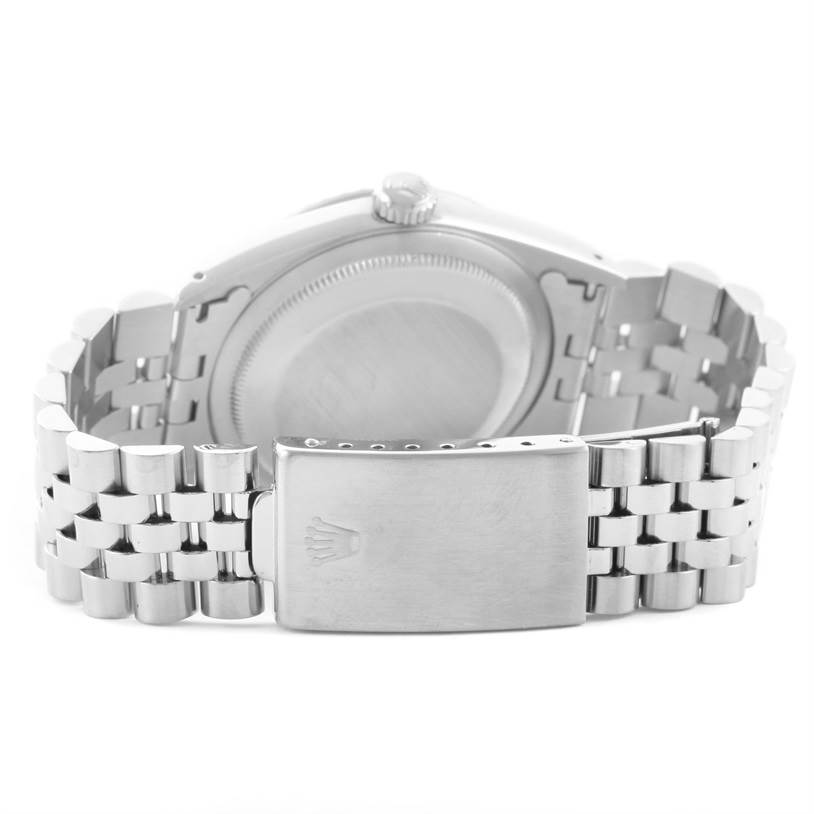 The image shows the back view of a Rolex Datejust 16220 Men's Stainless Steel Beige Dial 16220 Men's Stainless Steel Beige Dial watch, highlighting the case back and the clasp.