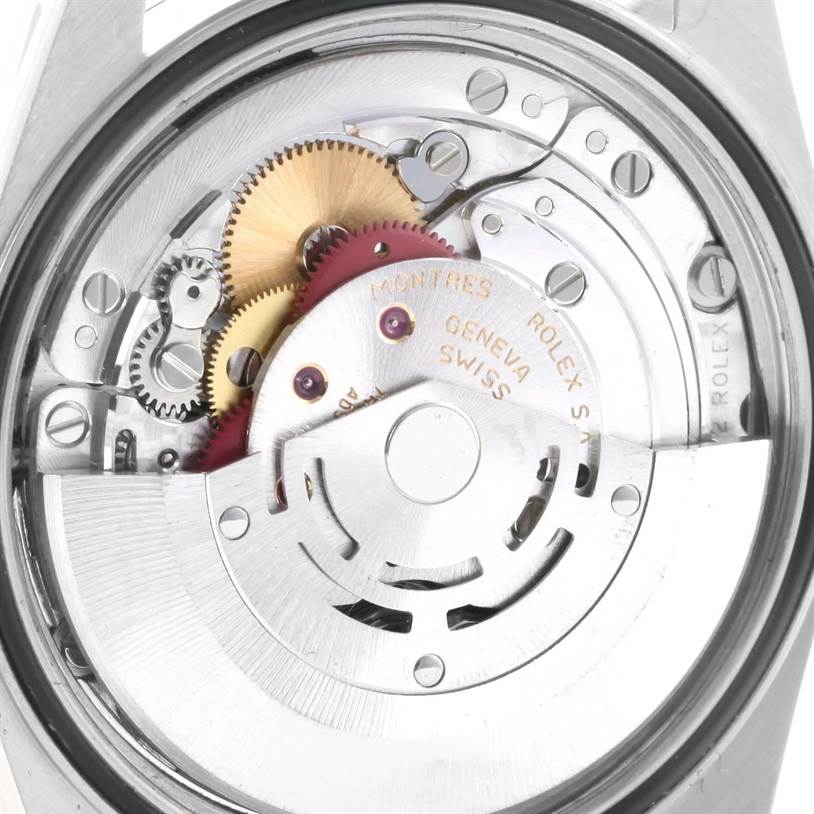 This image shows the internal mechanism and movement of the Rolex Datejust 16220 Men's Stainless Steel Beige Dial 16220 Men's Stainless Steel Beige Dial watch viewed from the case back.