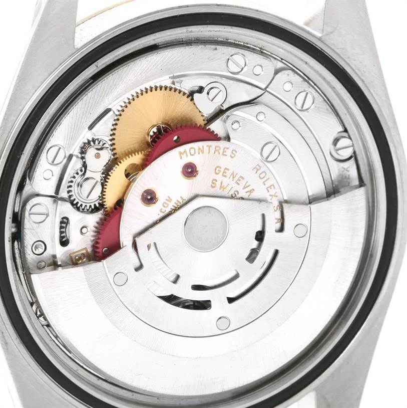 This image shows the internal mechanism and movement of a Rolex Datejust 16233 Men's Steel and Gold (two tone) White Dial 16233 Men's Steel and Gold (two tone) White Dial watch, viewed from the back with the case removed.