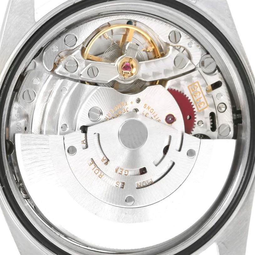 This image shows a close-up view of the movement mechanism inside a Rolex Datejust 16220 Men's Stainless Steel Blue Dial 16220 Men's Stainless Steel Blue Dial watch.