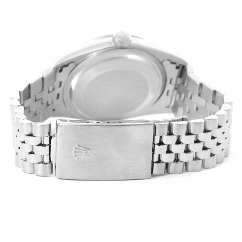 This image shows a rear view of a Rolex Datejust 16220 Men's Stainless Steel Blue Dial 16220 Men's Stainless Steel Blue Dial watch, focusing on the case back and bracelet clasp.