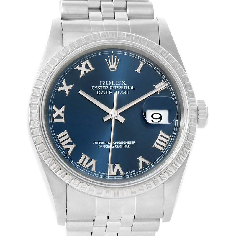 The image shows a front view of a Rolex Datejust watch, displaying its blue dial, Roman numerals, and date window.