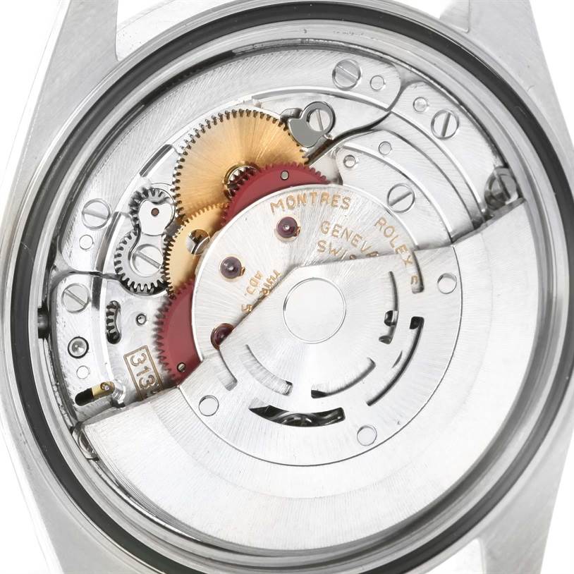 The image shows the movement and internal mechanism of a Rolex Datejust 16234 Men's Stainless Steel White Dial 16234 Men's Stainless Steel White Dial watch from a rear perspective.