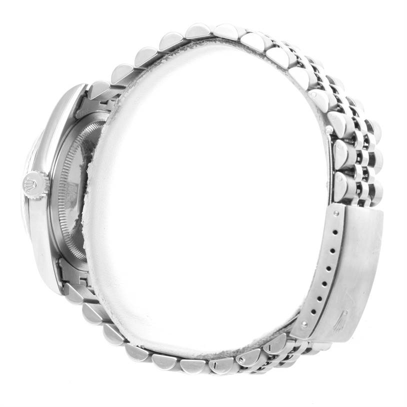 The image shows a side view of a Rolex Datejust 16234 Men's Stainless Steel White Dial 16234 Men's Stainless Steel White Dial watch, highlighting the bracelet and clasp.
