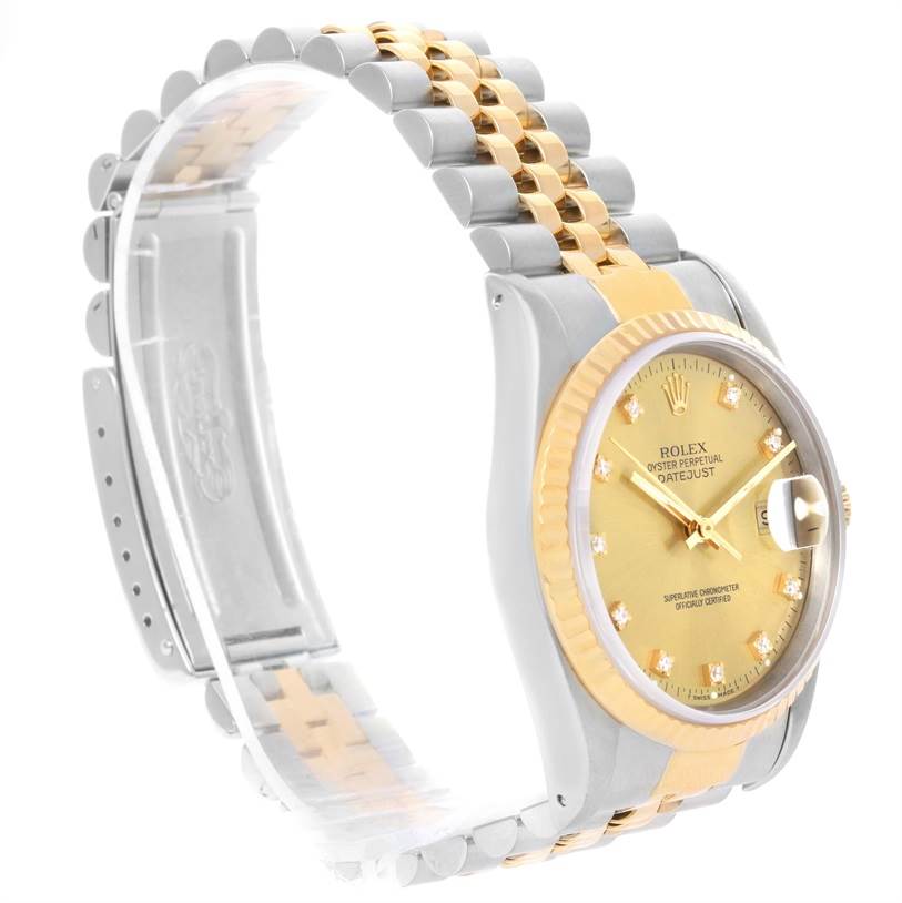 This image shows a Rolex Datejust 16233 Men's Steel and Gold (two tone) Champagne Dial 16233 Men's Steel and Gold (two tone) Champagne Dial watch at a three-quarter angle, displaying its gold dial, two-tone bracelet, fluted bezel, and date feature.