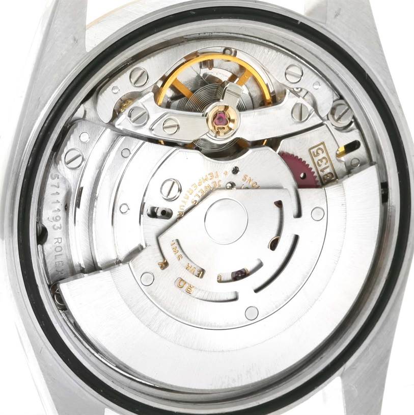 This image shows the movement mechanism of a Rolex Datejust 16233 Men's Steel and Gold (two tone) Champagne Dial 16233 Men's Steel and Gold (two tone) Champagne Dial watch from the back angle.