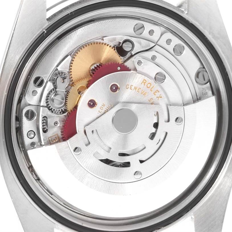 This is the back view of a Rolex Datejust 116244 Men's Stainless Steel Mother of Pearl Dial 116244 Men's Stainless Steel Mother of Pearl Dial watch showcasing its movement and internal gears.