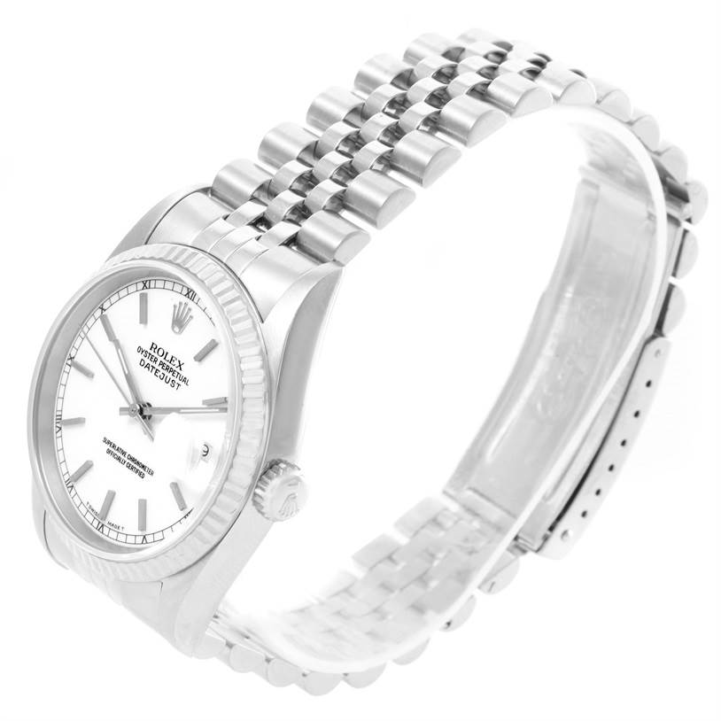The Rolex Datejust 16234 Men's Stainless Steel White Dial 16234 Men's Stainless Steel White Dial watch is shown at an angle displaying the dial, crown, and Jubilee bracelet.