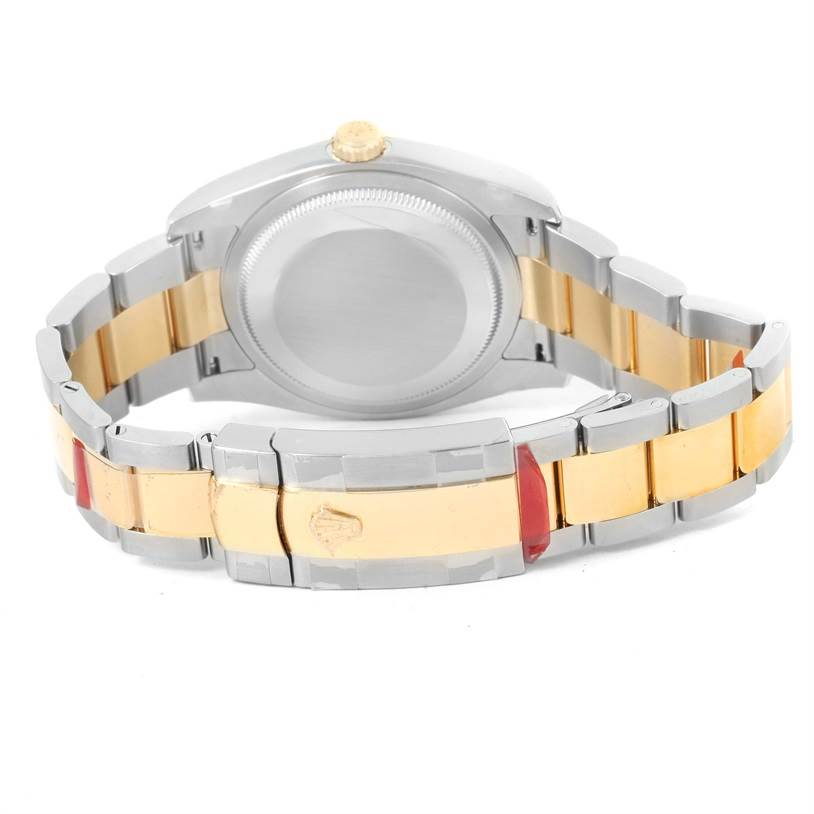 This image shows the back view of a Rolex Datejust 116203 Men's Stainless Steel Champagne Dial 116203 Men's Stainless Steel Champagne Dial watch focusing on the case back and two-tone bracelet.