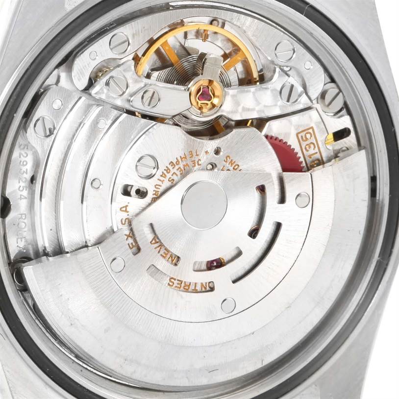 The image shows the intricate inner mechanical movement of a Rolex Datejust 16233 Men's Steel and Gold (two tone) Beige Dial 16233 Men's Steel and Gold (two tone) Beige Dial watch viewed from the back.