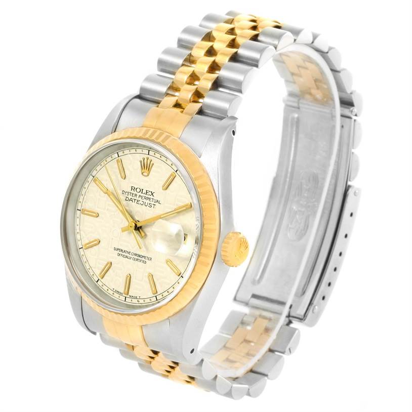 This is a Rolex Datejust 16233 Men's Steel and Gold (two tone) Beige Dial 16233 Men's Steel and Gold (two tone) Beige Dial watch shown at an angle displaying its face, bezel, crown, and partially open two-tone bracelet.