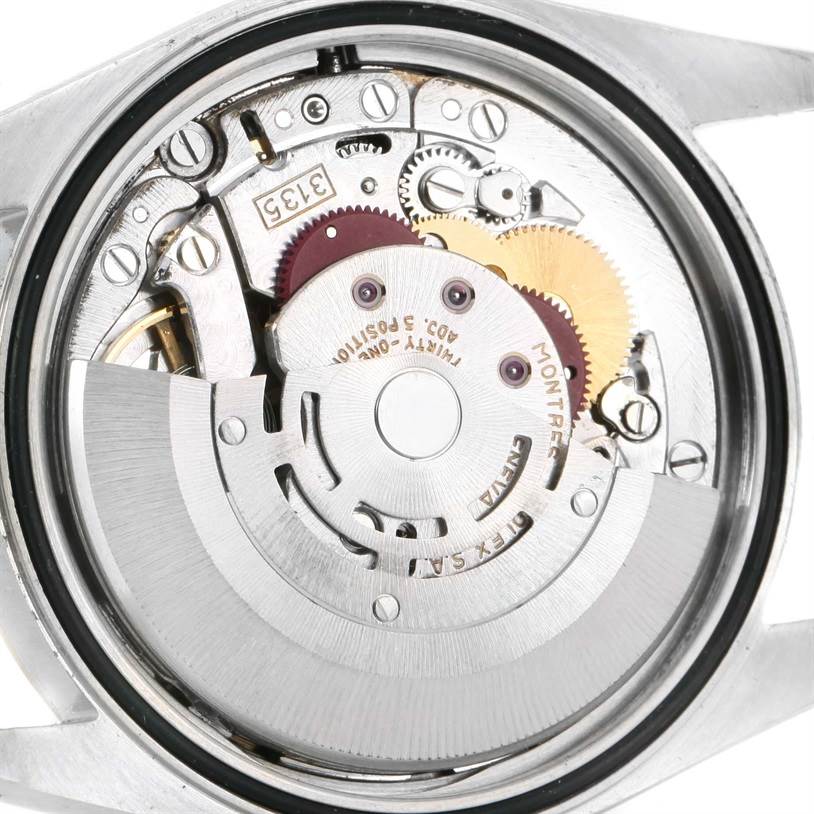 This image shows the internal mechanism of the Rolex Datejust 16233 Steel and Gold (two tone) Champagne Dial 16233 Steel and Gold (two tone) Champagne Dial watch from a back-facing angle with its case removed.