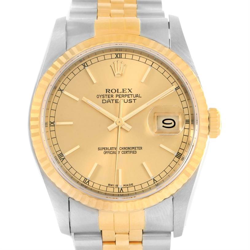 The Rolex Datejust 16233 Steel and Gold (two tone) Champagne Dial 16233 Steel and Gold (two tone) Champagne Dial watch is shown from a top-down angle, highlighting the dial, bezel, and part of the bracelet.