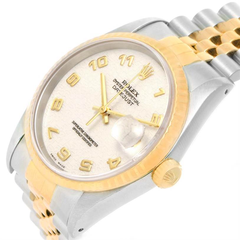 This image shows a Rolex Datejust 16233 Men's Steel and Gold (two tone) Beige Dial 16233 Men's Steel and Gold (two tone) Beige Dial watch from a top-front angle, highlighting the face, bezel, and part of the bracelet.
