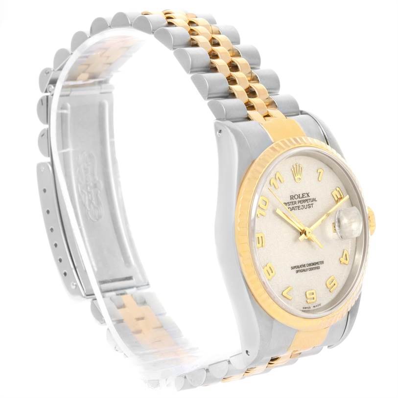 The image shows a Rolex Datejust 16233 Men's Steel and Gold (two tone) Beige Dial 16233 Men's Steel and Gold (two tone) Beige Dial watch from an oblique angle, detailing the dial, case, bezel, and two-tone bracelet.