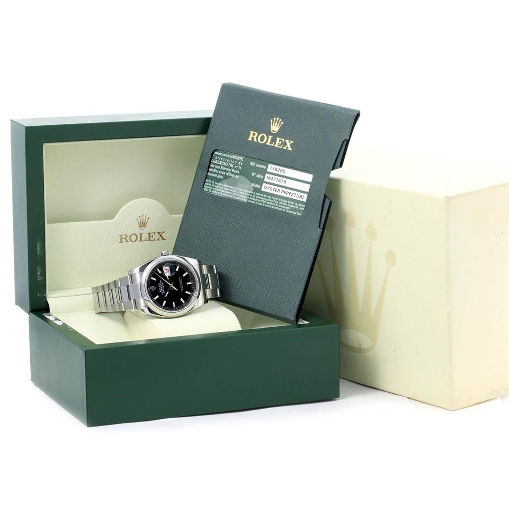 The image shows a Rolex Datejust 116200 Men's Stainless Steel Black Dial 116200 Men's Stainless Steel Black Dial watch at an angled front view, inside an open green Rolex box with accompanying documents.