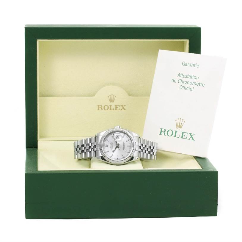 The image shows a Rolex Datejust 116234 Men's Stainless Steel Silver Dial 116234 Men's Stainless Steel Silver Dial watch inside its box from a front angle, along with a warranty booklet.