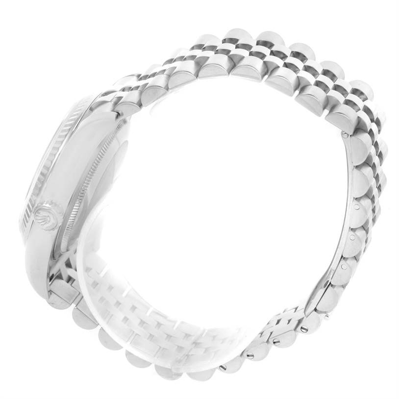 This image shows a side view of the band, case, and crown of a Rolex Datejust 116234 Men's Stainless Steel Silver Dial 116234 Men's Stainless Steel Silver Dial watch.