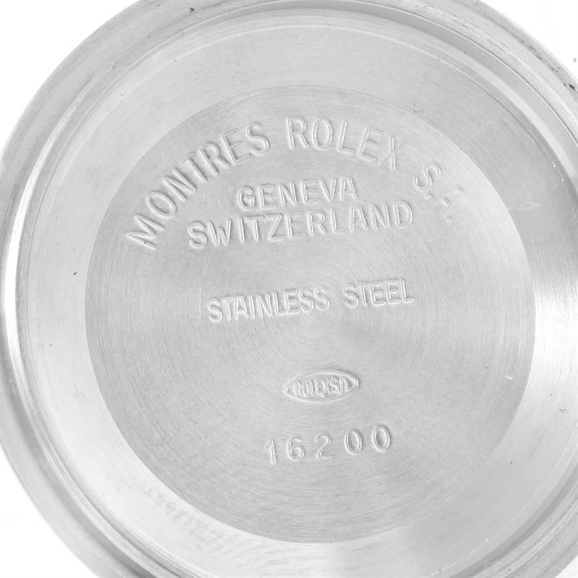 This image shows the inner case back of a Rolex Datejust 16233 Men's Steel and Gold (two tone) White Dial 16233 Men's Steel and Gold (two tone) White Dial watch, displaying branding and model information.