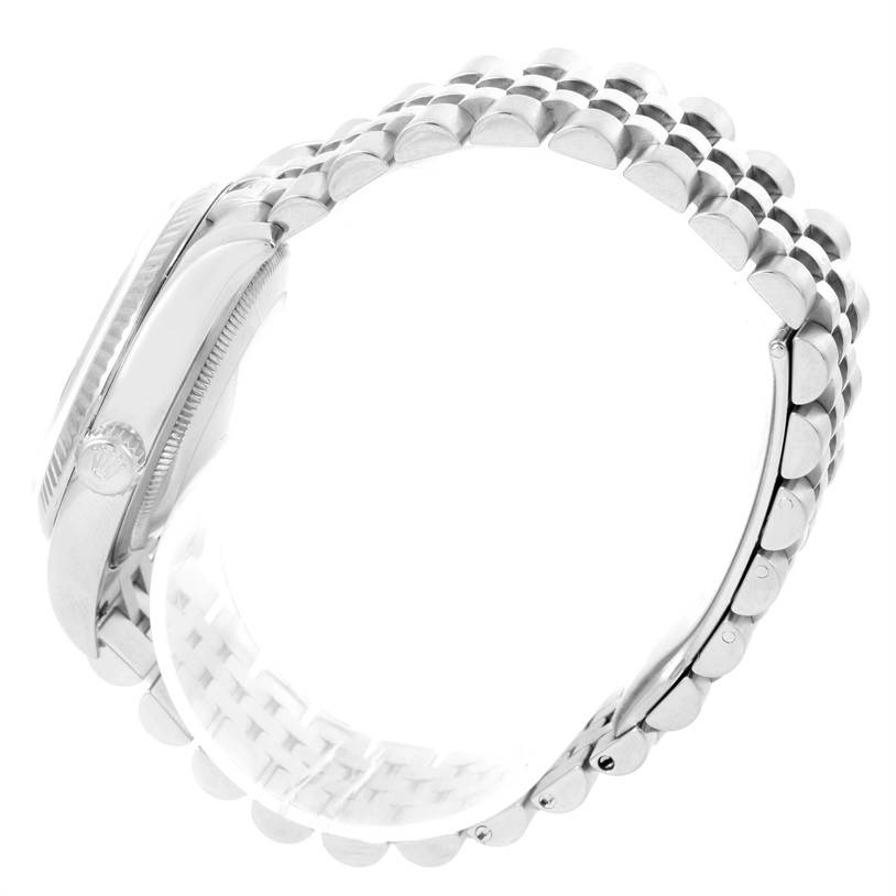 The image shows a side view of a Rolex Datejust 116234 Men's Stainless Steel Blue Dial 116234 Men's Stainless Steel Blue Dial watch, highlighting its case and metal bracelet.