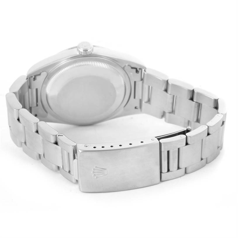 The image shows the back case and clasp of the Rolex Datejust 16200 Men's Stainless Steel Blue Dial 16200 Men's Stainless Steel Blue Dial watch, emphasizing the bracelet and crown logo on the clasp.