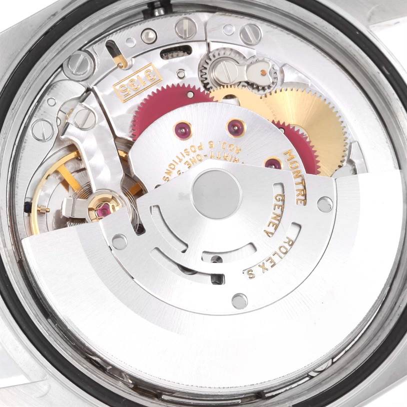 This image shows the intricate mechanical movement and internal components of a Rolex Datejust 16200 Men's Stainless Steel Blue Dial 16200 Men's Stainless Steel Blue Dial watch.