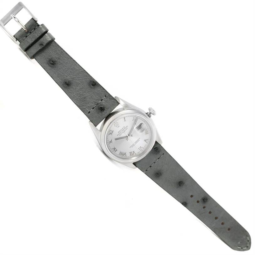 The image shows a Rolex Datejust 16200 Men's Stainless Steel Silver Dial 16200 Men's Stainless Steel Silver Dial watch laid flat, displaying the face, crown, and entire strap from a top-down angle.