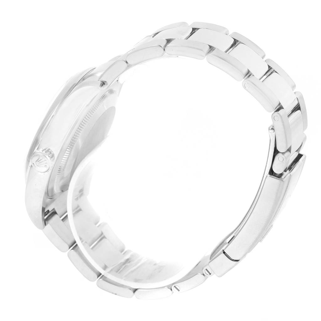 The image shows a side view of a Rolex Datejust 116200 Men's Stainless Steel Black Dial 116200 Men's Stainless Steel Black Dial watch, highlighting the case, crown, and part of the bracelet.