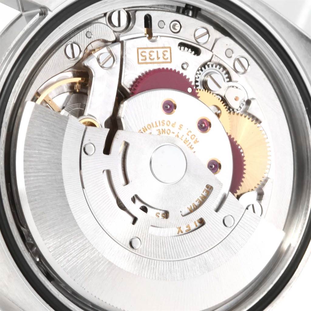 This image shows the internal mechanical movement of a Rolex Datejust 116200 Men's Stainless Steel Black Dial 116200 Men's Stainless Steel Black Dial model watch.