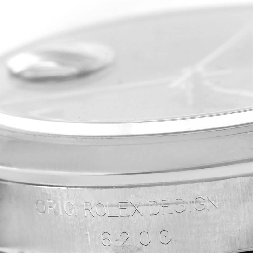 This close-up image shows the side profile and engraved serial number of a Rolex Datejust 16200 Men
s Stainless Steel Black Dial 16200 Men
s Stainless Steel Black Dial watch.