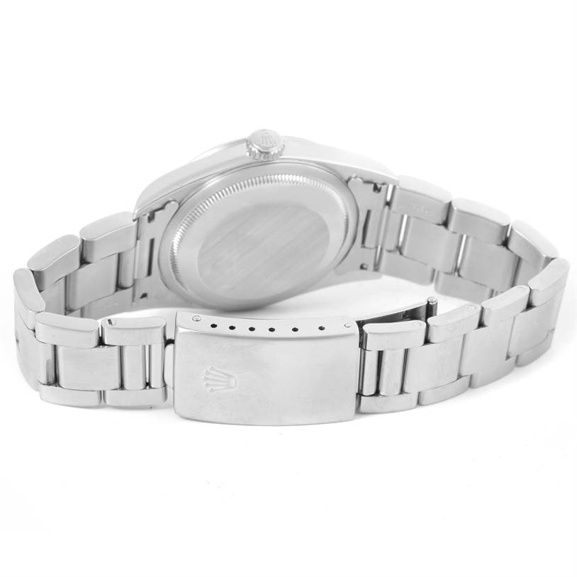 This image shows the backside and clasp of a Rolex Datejust 16200 Men
s Stainless Steel Black Dial 16200 Men
s Stainless Steel Black Dial watch in a partially opened position.