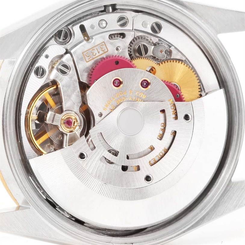 The image shows the internal mechanical components of a Rolex Datejust 15223 Men's Steel and Gold (two tone) White Dial 15223 Men's Steel and Gold (two tone) White Dial watch from a close-up, top-down angle.