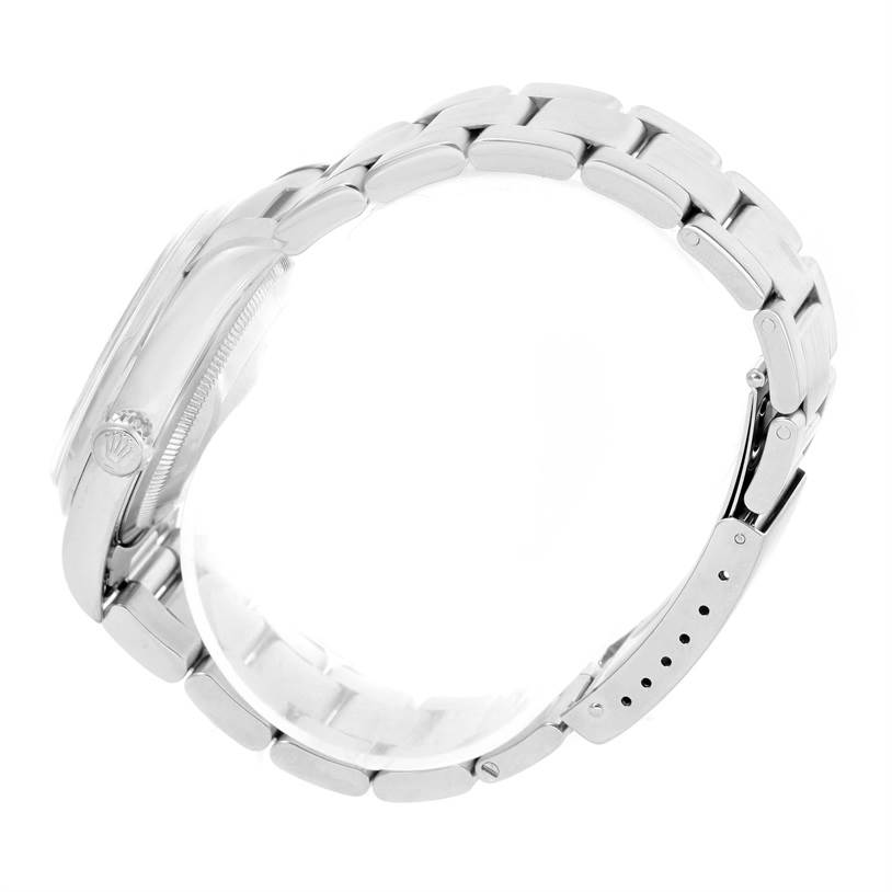 This image shows a side view of a Rolex Datejust 16200 Men
s Stainless Steel White Dial 16200 Men
s Stainless Steel White Dial watch, highlighting the bracelet and partially the case.