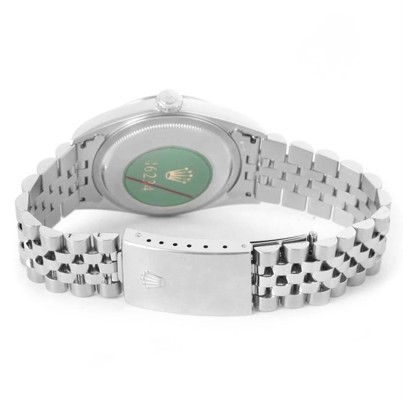 The image shows the back case, crown, and bracelet with clasp of a Rolex Datejust 16234 Men
s Stainless Steel White Dial 16234 Men
s Stainless Steel White Dial watch.