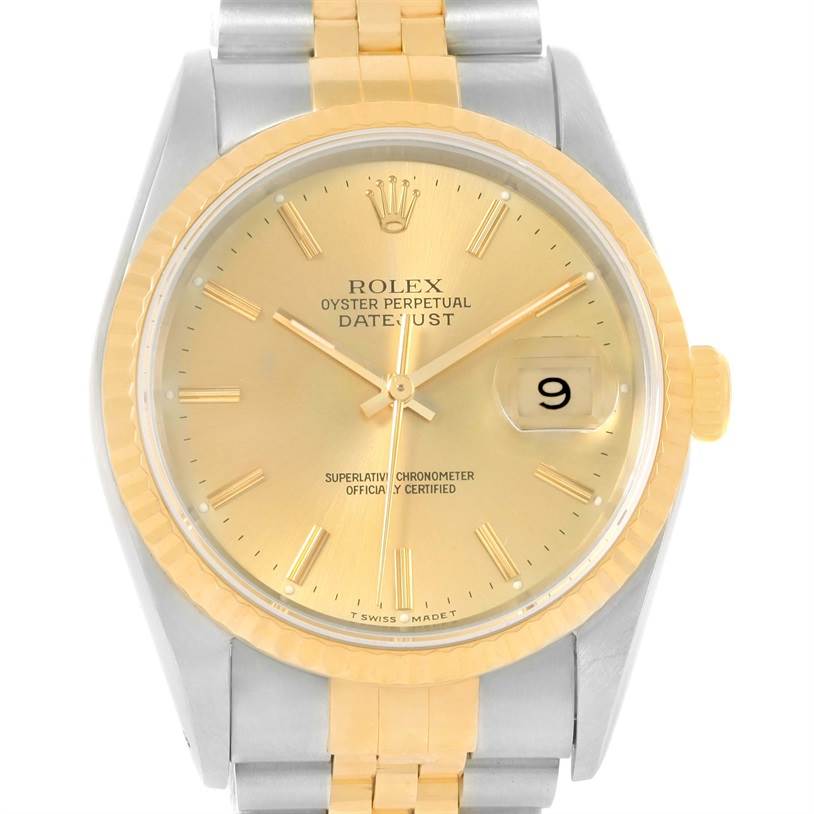 The Rolex Datejust 16233 Men's Steel and Gold (two tone) Champagne Dial 16233 Men's Steel and Gold (two tone) Champagne Dial watch is shown from a front angle, displaying its gold dial, bezel, and the date window.