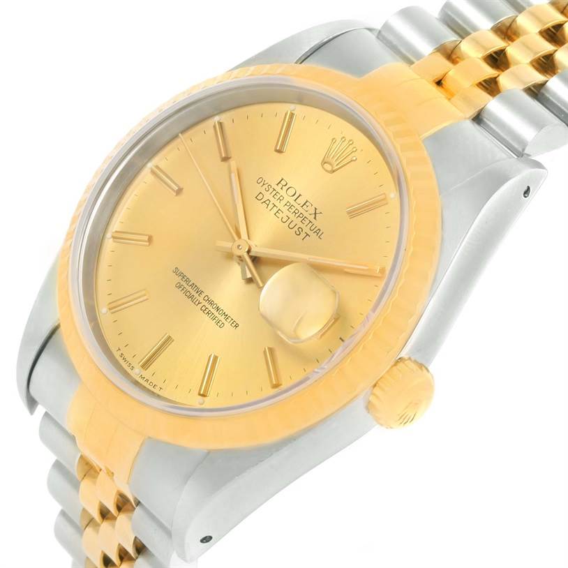 The Rolex Datejust 16233 Men's Steel and Gold (two tone) Champagne Dial 16233 Men's Steel and Gold (two tone) Champagne Dial watch is shown at a slight angle, highlighting its golden dial, bezel, and two-tone bracelet.