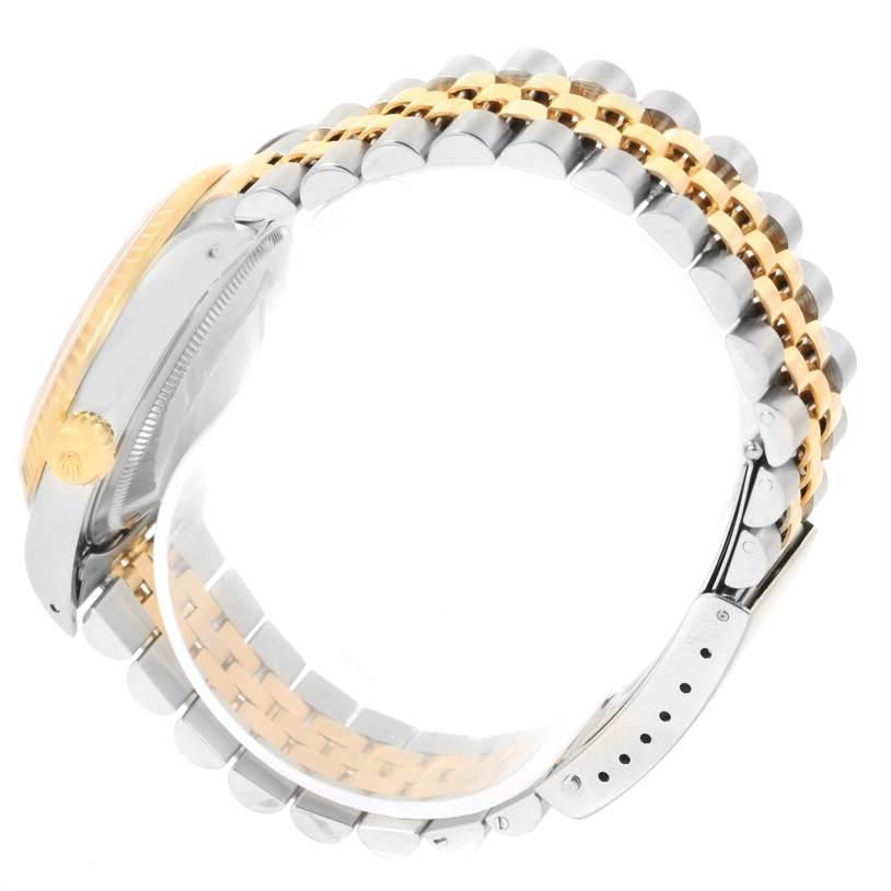 This image shows the bracelet, clasp, crown, and side view of the Rolex Datejust 16233 Men's Steel and Gold (two tone) Champagne Dial 16233 Men's Steel and Gold (two tone) Champagne Dial model.