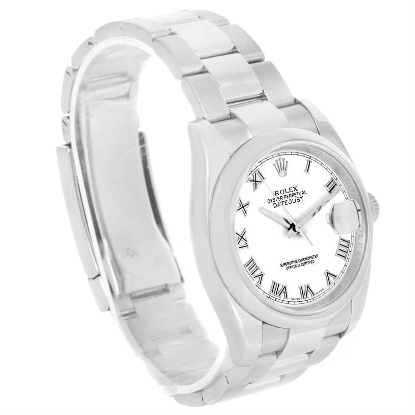 The Rolex Datejust 116200 Men
s Stainless Steel White Dial 116200 Men
s Stainless Steel White Dial watch is shown at a slight angle, displaying its bracelet, case, dial, Roman numeral markers, and date window.