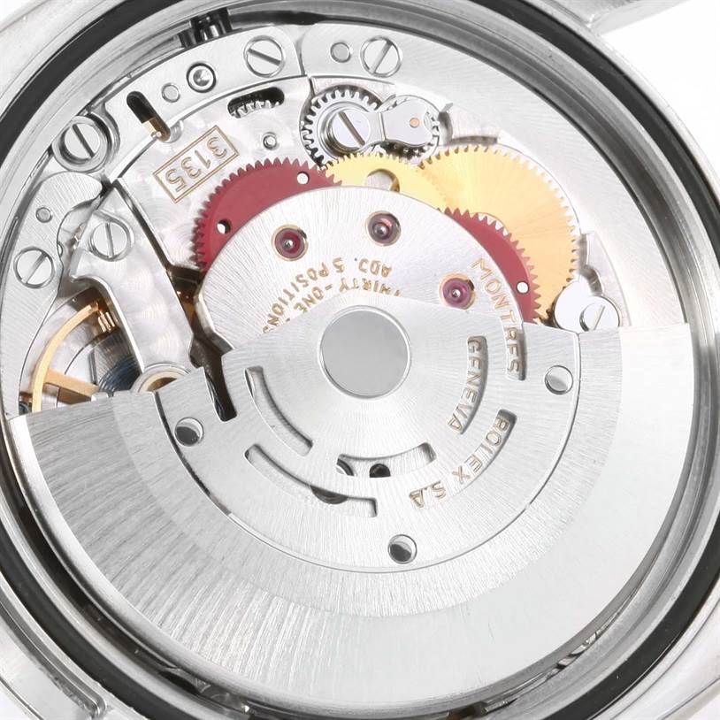 This image shows the internal movement mechanism of a Rolex Datejust 116200 Men
s Stainless Steel White Dial 116200 Men
s Stainless Steel White Dial watch.