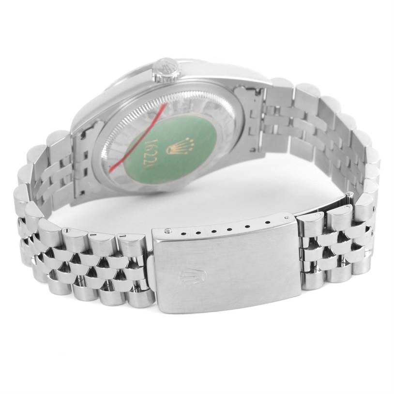 The image shows the back of a Rolex Datejust 16220 Men
s Stainless Steel Silver Dial 16220 Men
s Stainless Steel Silver Dial watch, highlighting its case, case back, crown, and bracelet with a clasp.