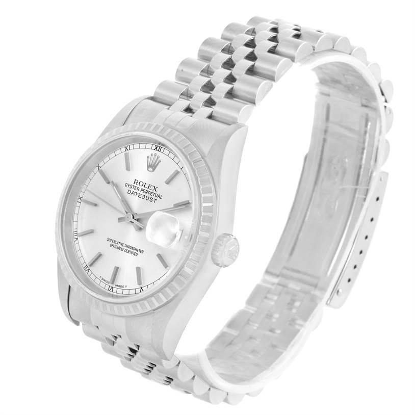 The image shows a side and front angle of a Rolex Datejust 16220 Men
s Stainless Steel Silver Dial 16220 Men
s Stainless Steel Silver Dial watch, highlighting its silver dial, fluted bezel, and bracelet.