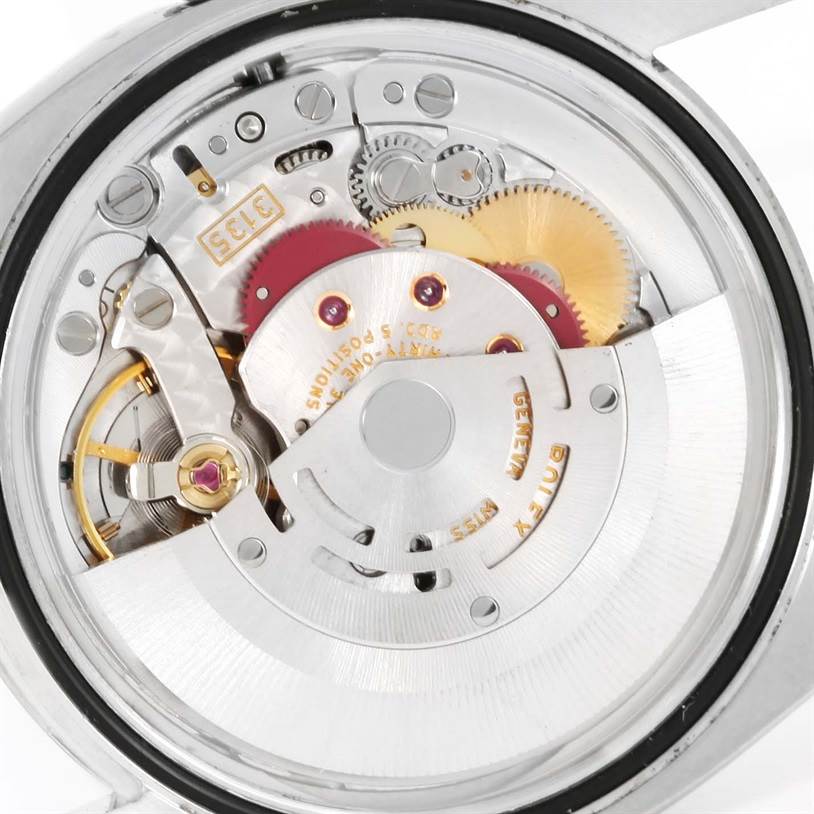This image shows the internal mechanical movement of a Rolex Datejust 116234 Men
s Stainless Steel Black Dial 116234 Men
s Stainless Steel Black Dial watch from a rear angle.