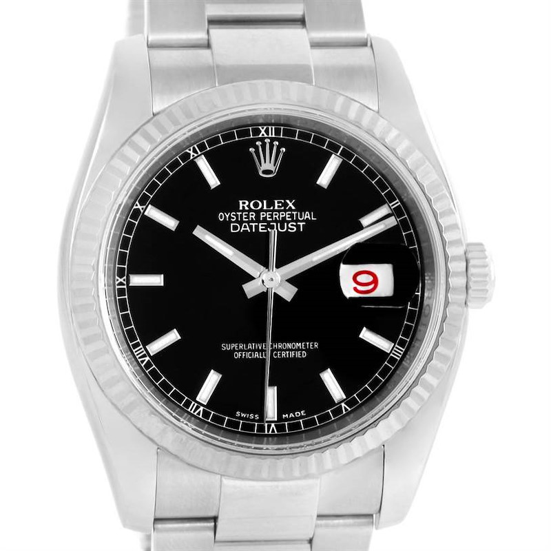 The image shows a front view of a Rolex Datejust watch, featuring a black dial, date display, and stainless steel bracelet.