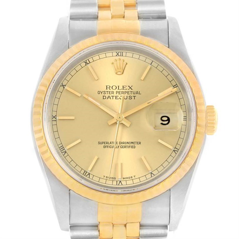 The image shows a front view of a Rolex Datejust watch, featuring its gold dial, fluted bezel, and two-tone bracelet.