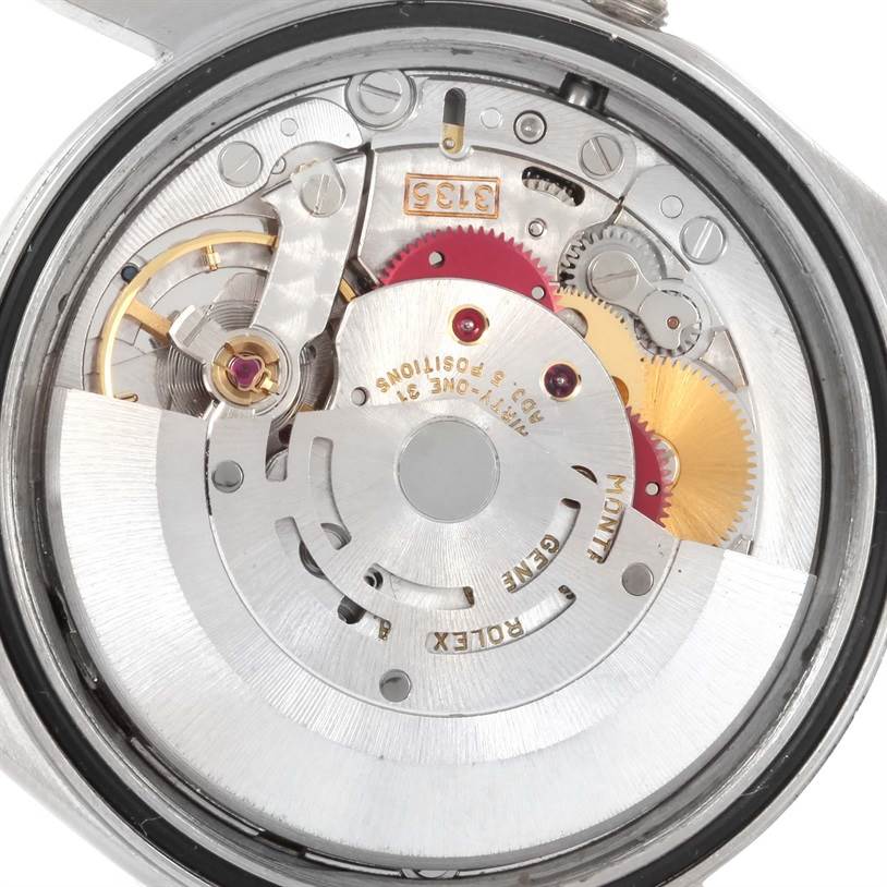 This is a close-up view of the internal mechanism of a Rolex Datejust 16234 Men's Stainless Steel Silver Dial 16234 Men's Stainless Steel Silver Dial watch, showing its intricate gears and components.
