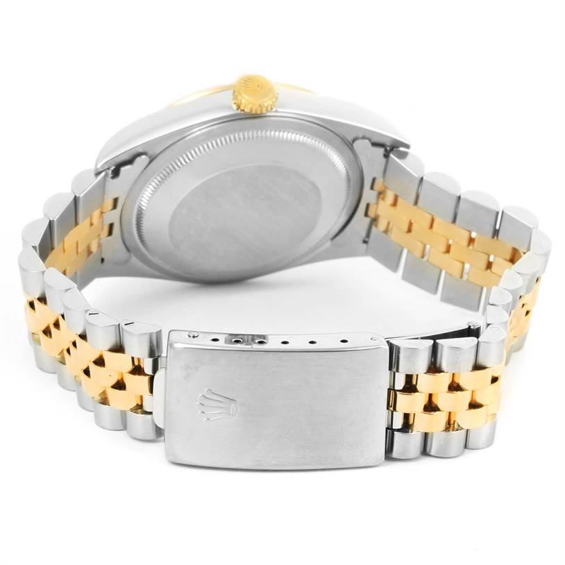 This shows the back of a Rolex Datejust 16233 Men
s Steel and Gold (two tone) Beige Dial 16233 Men
s Steel and Gold (two tone) Beige Dial watch, focusing on the clasp, bracelet, case back, and crown.