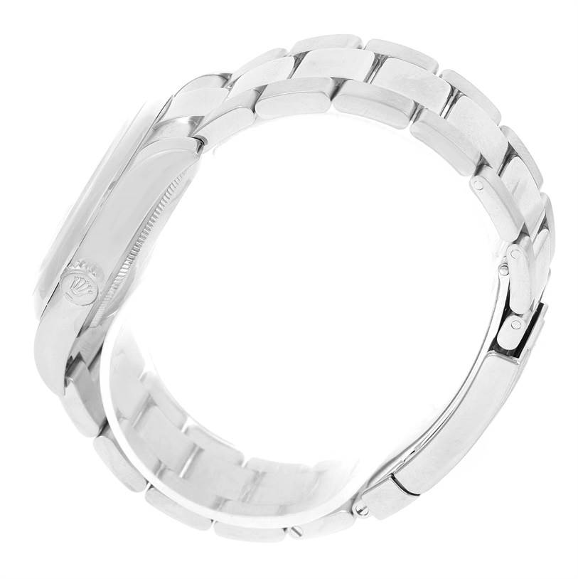 The image shows a side view of a Rolex Datejust 116200 Men
s Stainless Steel Black Dial 116200 Men
s Stainless Steel Black Dial, highlighting the case, crown, and metal bracelet.