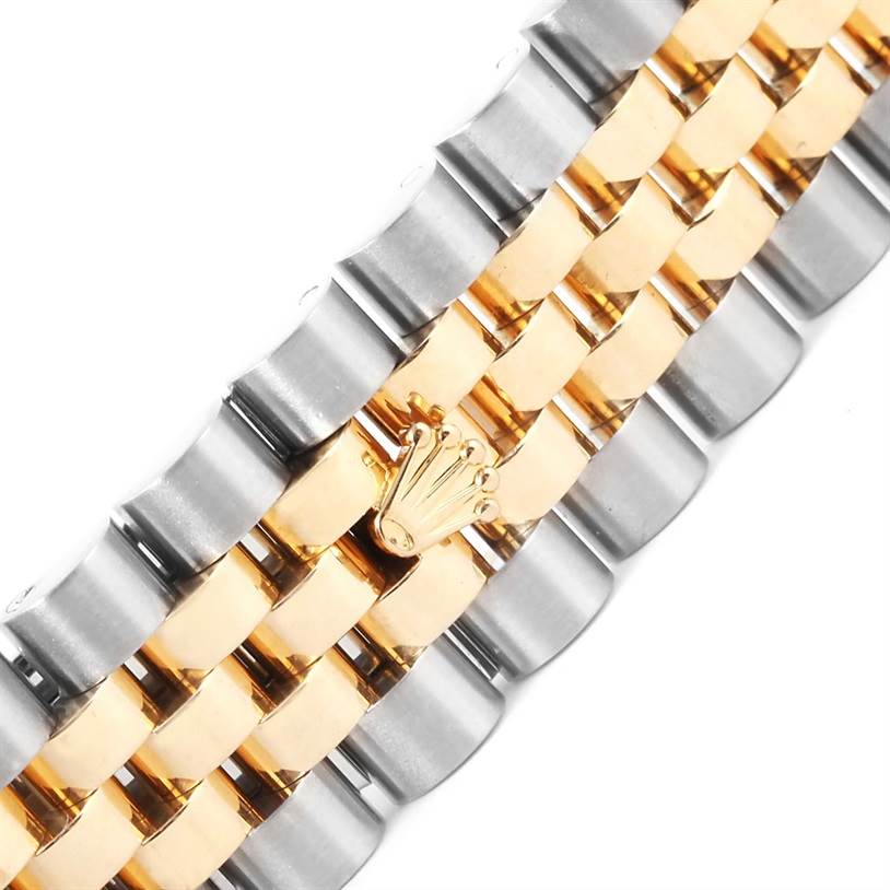 This image shows a close-up of the bracelet of a Rolex Datejust 116203 Men's Stainless Steel Grey Dial 116203 Men's Stainless Steel Grey Dial watch, highlighting the gold and silver links with the Rolex crown logo.